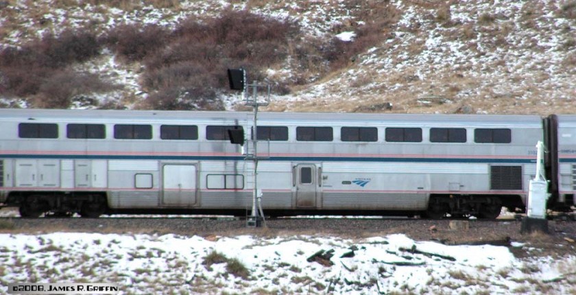 31027