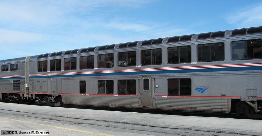 33027